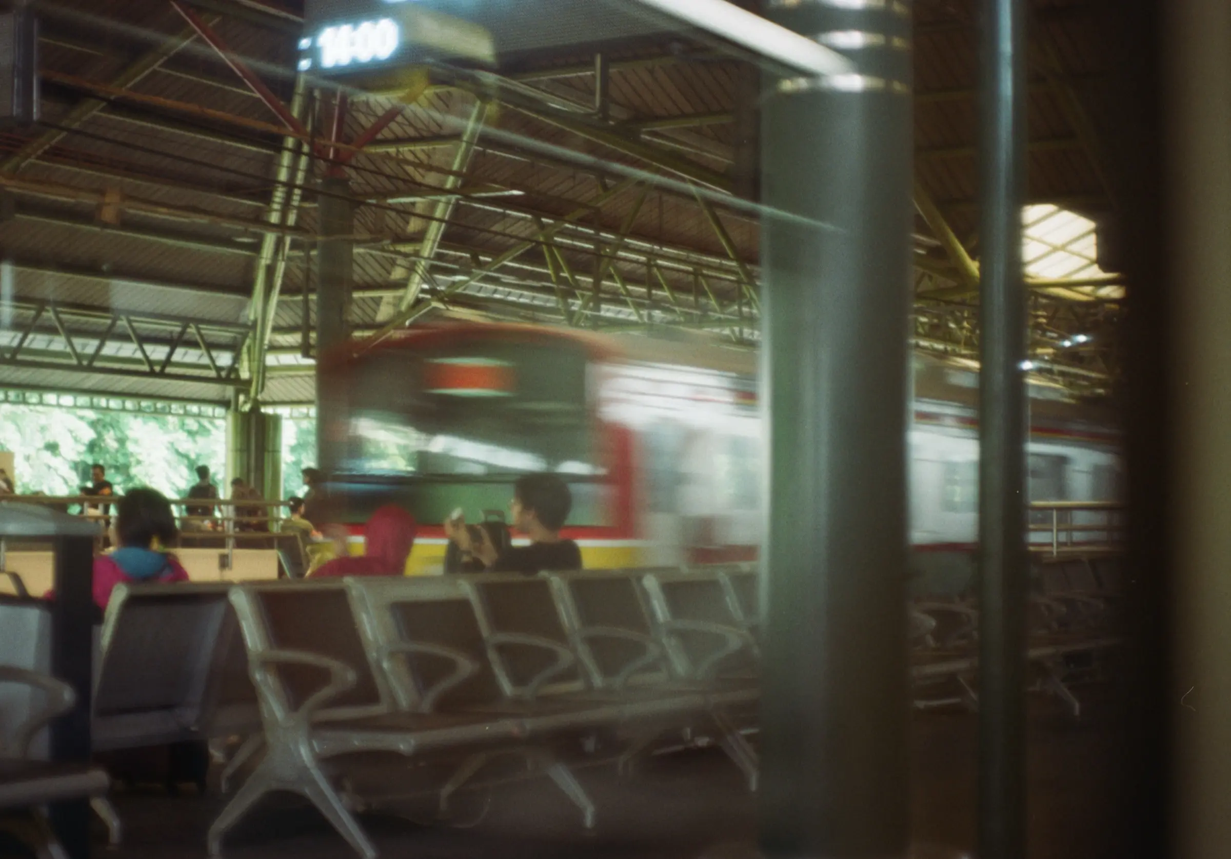 Motion-blurred train at the platform